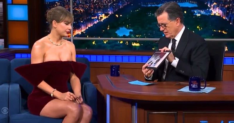 Taylor Swift turns heads in $1.7K burgundy velvet minidress on 'The Late Show with Stephen Colbert'