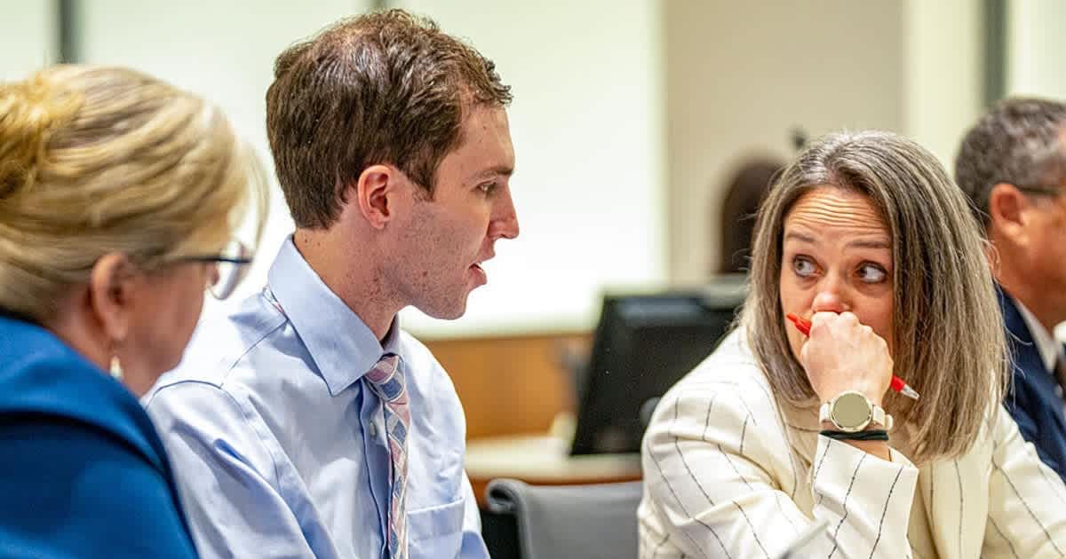Tyler Robinson, accused of fatally shooting Charlie Kirk, speaks with his defense attorneys Kathryn Nester and Staci Visser during a hearing on December 11, 2025, in Provo, Utah (Getty Images)