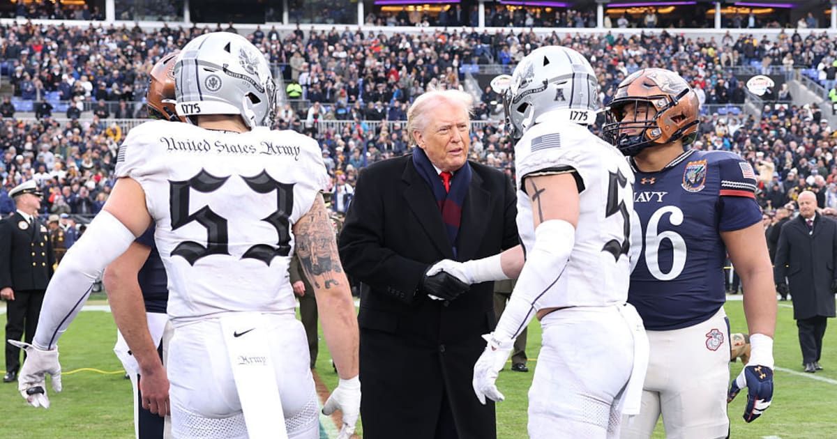 President Donald Trump’s pregame coin toss at the Army-Navy football game went viral online after viewers questioned his technique (Tasos Katopodis/Getty Images)