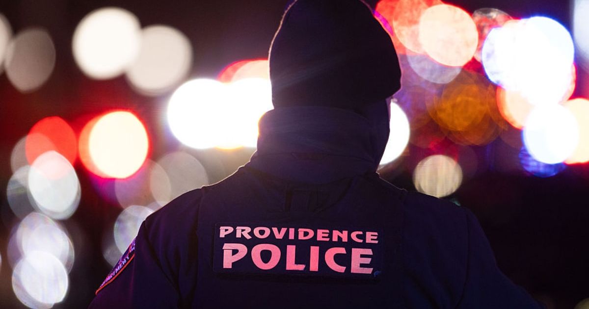 Police officers remain on the scene on Brown University's campus December 13, 2025 in Providence, Rhode Island. The campus was secured following a shooting as authorities continue investigation (Libby O'Neill/Getty Images)