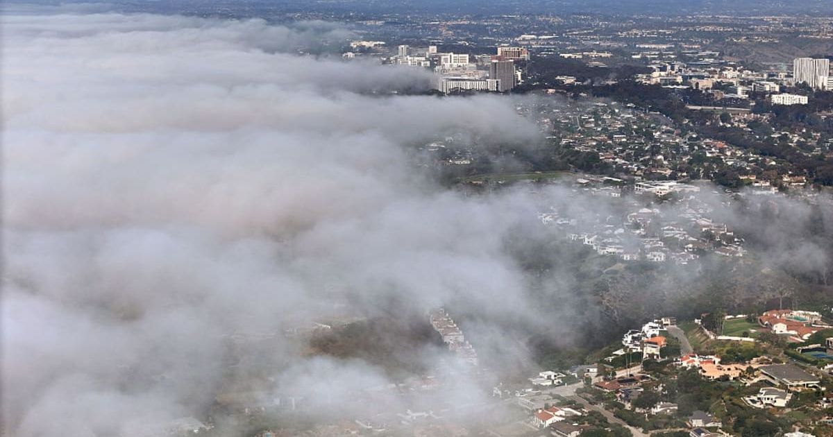 In an aerial view, fog envelopes the La Jolla coast on a fall day on December 12, 2025 in San Diego, California (Kevin Carter/Getty Images)