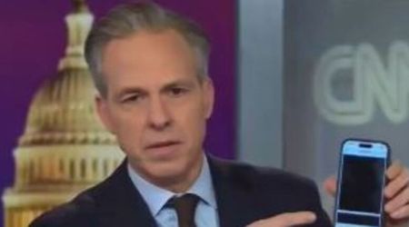 Jake Tapper shows blacked-out Epstein files on his phone: ‘100 pages of redaction’