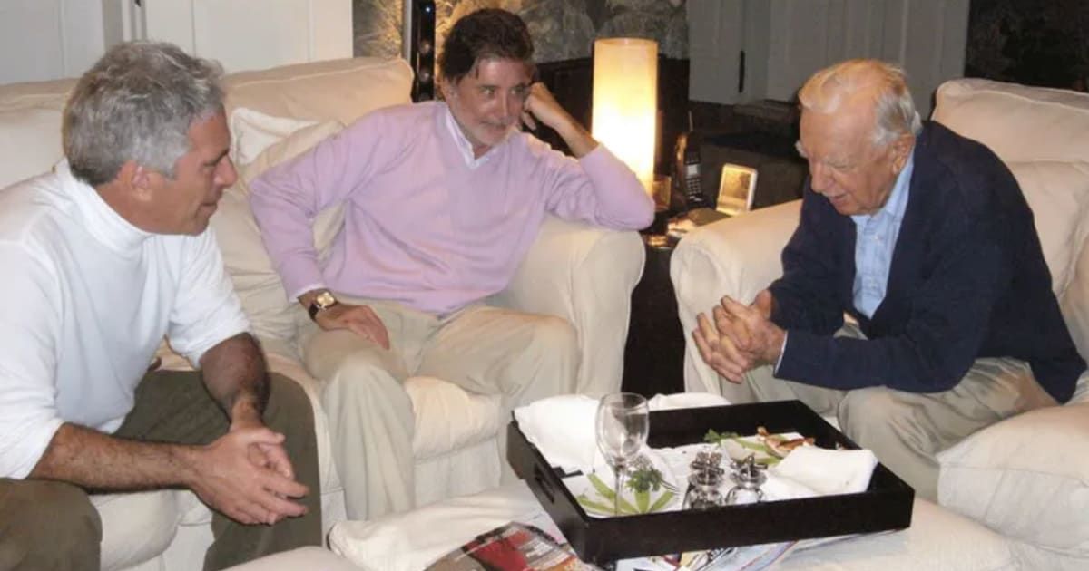 Walter Cronkite, once known as 'the most trusted man in America' during his tenure anchoring CBS Evening News, is seen with Jeffrey Epstein in newly released federal photos (@Department of Justice/X)