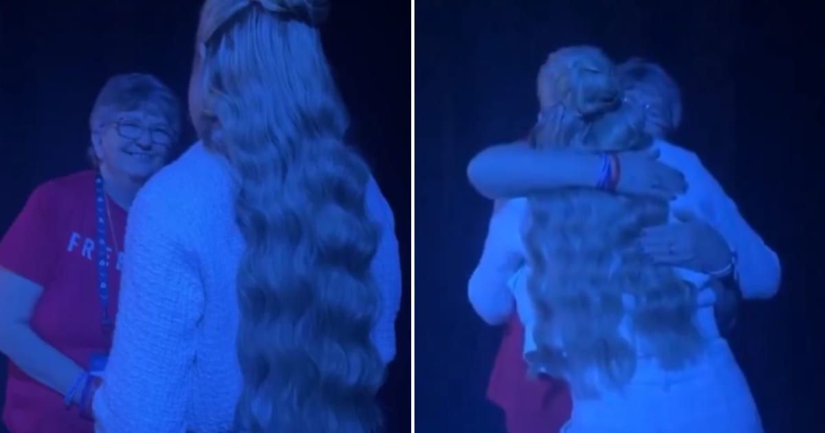 Erika Kirk embraces Jeanie Beeman after she faced harassment for wearing a 'Freedom' shirt (@EricLDaugh/X)