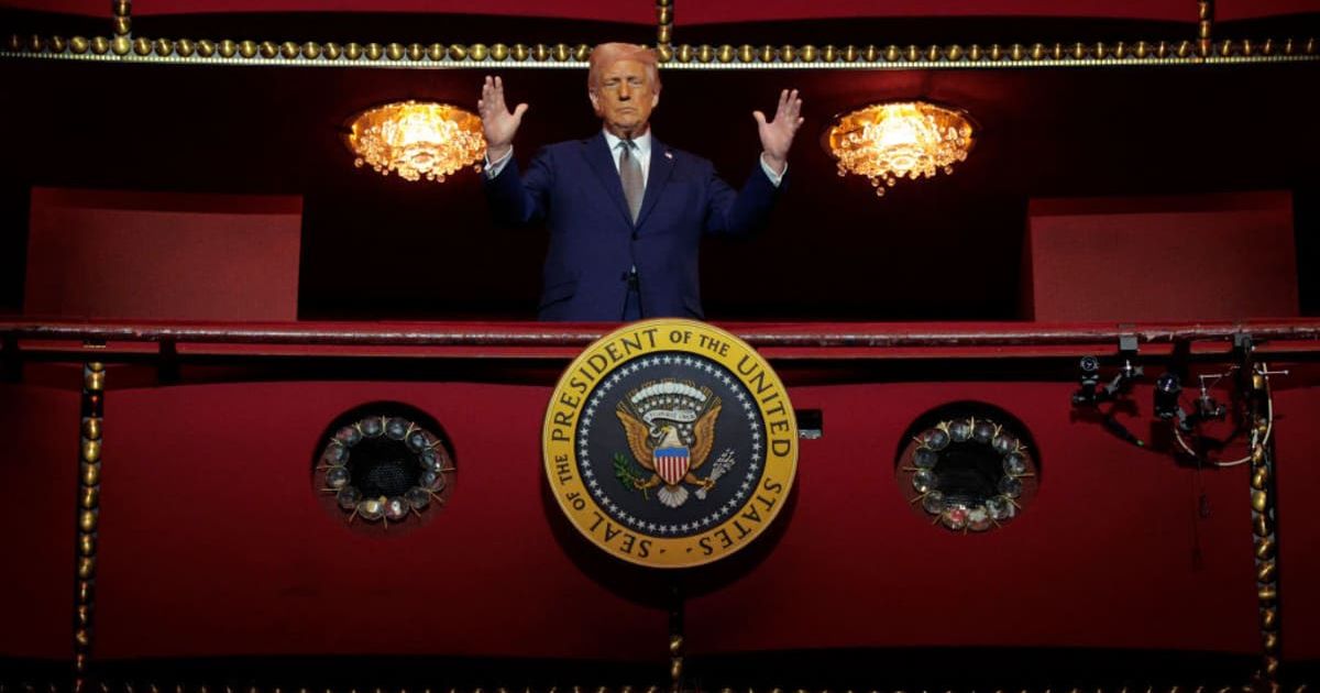 Donald Trump looks down from the Presidential Box in the Opera House at the John F Kennedy Center for the Performing Arts as he participates in a guided tour and leads a board meeting in Washington, DC (Getty Images)