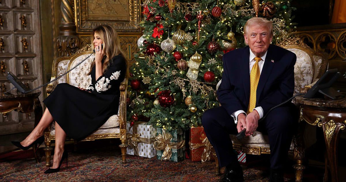 Donald Trump praised his wife Melania Trump’s Christmas decor and shared a humorous anecdote about arranging the room’s space (Tasos Katopodis/Getty Images)