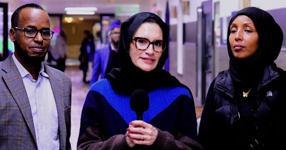 Peggy Flanagan wears a hijab during her visit to Somali businesses to show support for immigrant neighbors (Screengrab/Somali TV of Minnesota/YouTube)
