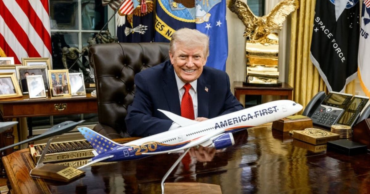 President Donald Trump displayed a model 'America First 250' plane during a burst of social media posts the day after Christmas (@whitehouse/X)