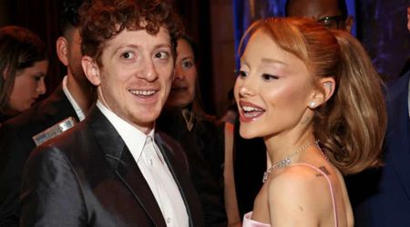 Ethan Slater shares ‘very merry’ holiday photos of Ariana Grande at home