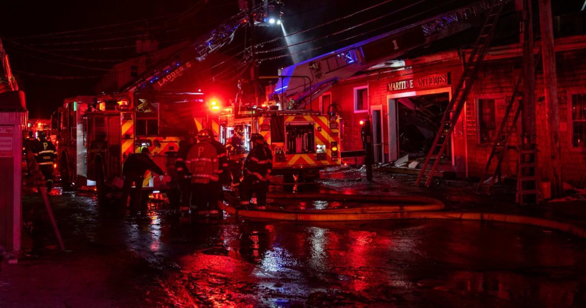 Firefighters battle a massive blaze at Portland’s historic Custom House wharf in Maine on Friday evening (@robertnettles02/X)