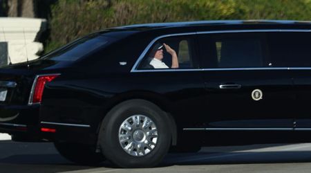 Trump waves as supporters flood streets outside his Florida golf course and chant 'we love you'