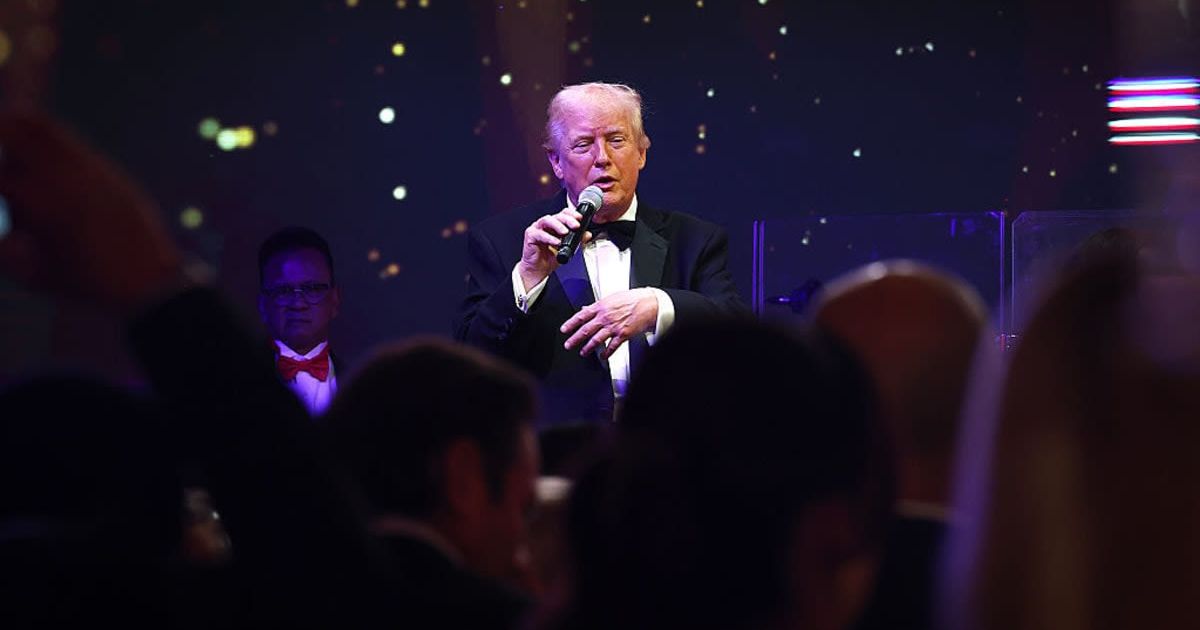 President Donald Trump speaks to guests during a New Year’s Eve event at his Mar-a-Lago home on December 31, 2025, in Palm Beach, Florida. (Photo by Joe Raedle/Getty Images)
