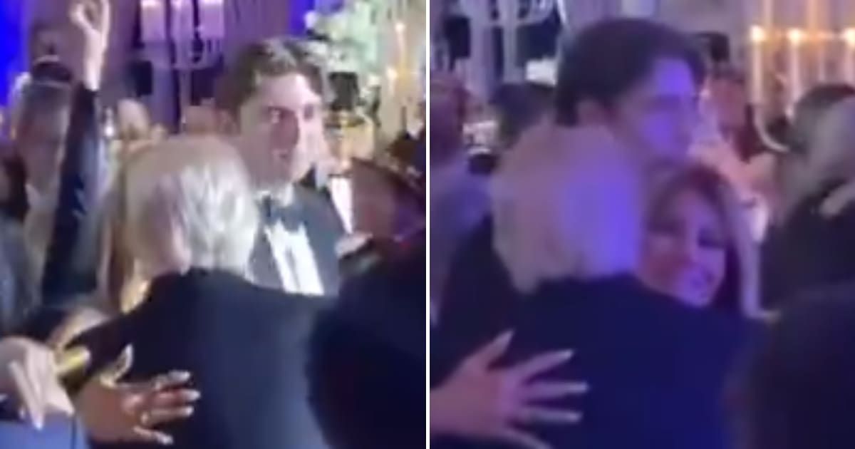 Melania Trump hugged and kissed Donald Trump as Barron Trump looked on during the New Year’s Eve celebration (@lenashyrokova/TikTok)