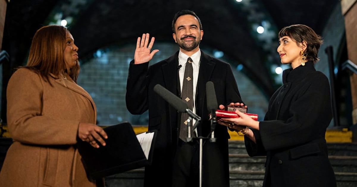 Zohran Mamdani is sworn in as New York City's 112th mayor by New York Attorney General Letitia James, left, alongside his wife Rama Duwaji, right, in the former City Hall subway station on January 1, 2026 in New York City (Getty Images)