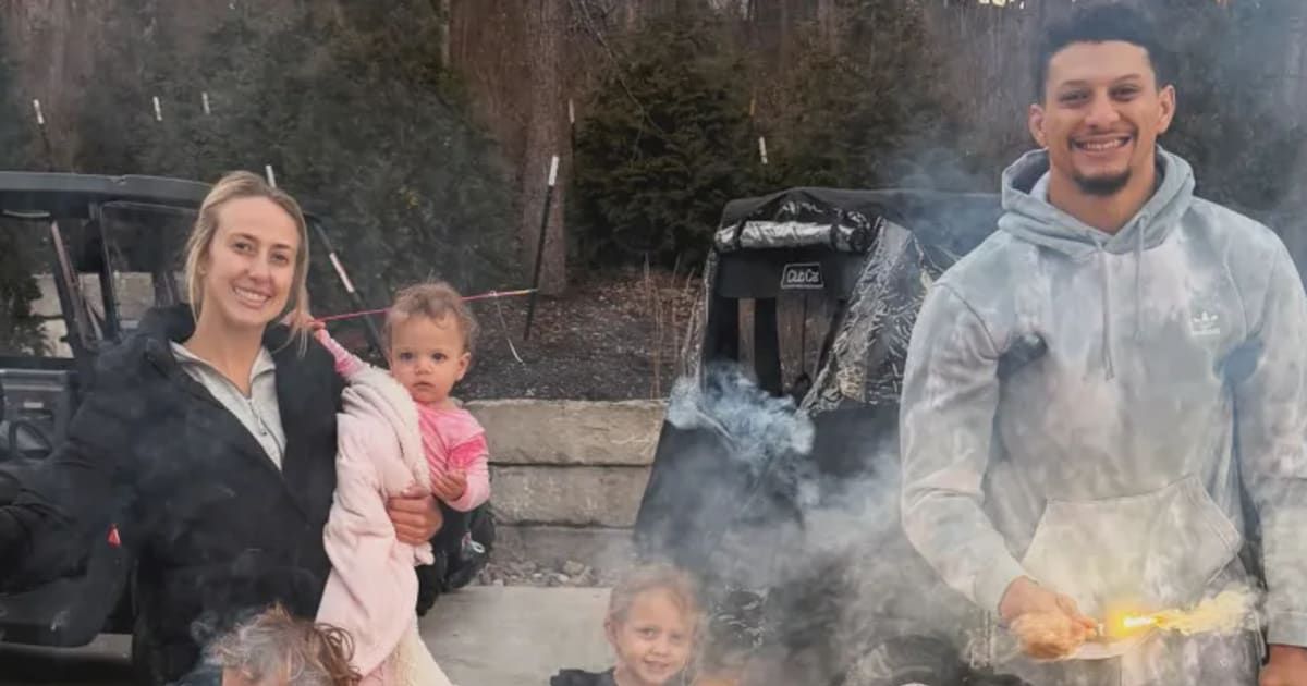 Brittany Mahomes, 30, shared a family photo to her Instagram Stories, featuring Patrick Mahomes grinning in a gray hoodie and matching shorts (@brittanylynne/Instagram)