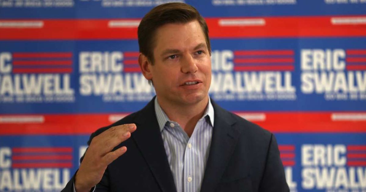 During an interview with MS Now, California gubernatorial candidate Eric Swalwell said federal immigration officers who wear masks won't be eligible to drive in state if he is elected (Justin Sullivan/Getty Images)