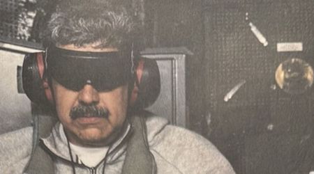 Nicolas Maduro seen in cuffs and blindfold aboard USS Iwo Jima in first photo as he is flown to NYC