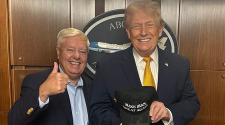 Trump poses with 'Make Iran Great Again' hat alongside Lindsey Graham amid protests in Iran