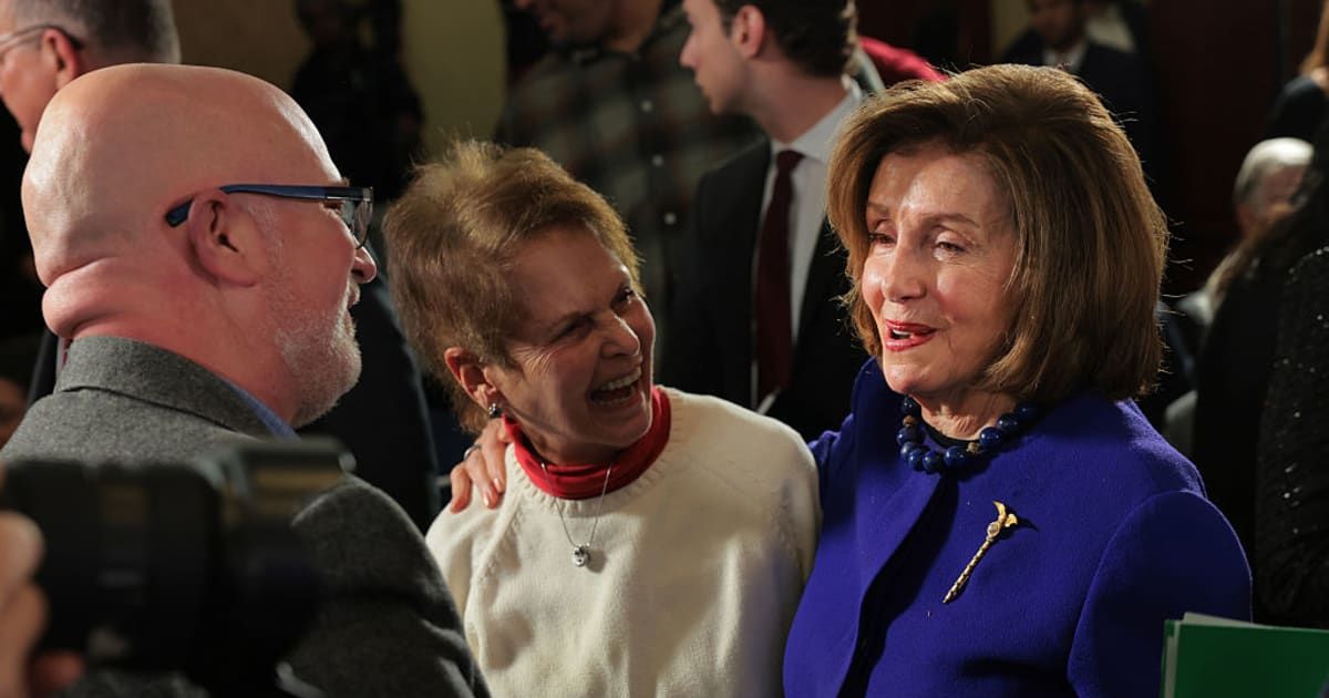 US Rep Nancy Pelosi hugs Gladys and Ken Sicknick, the mother and brother of deceased US Capitol Police Officer Brian Sicknick, at a hearing to mark the fifth anniversary of the January 6, 2021 attack on the US Capitol Building. (Getty Images)