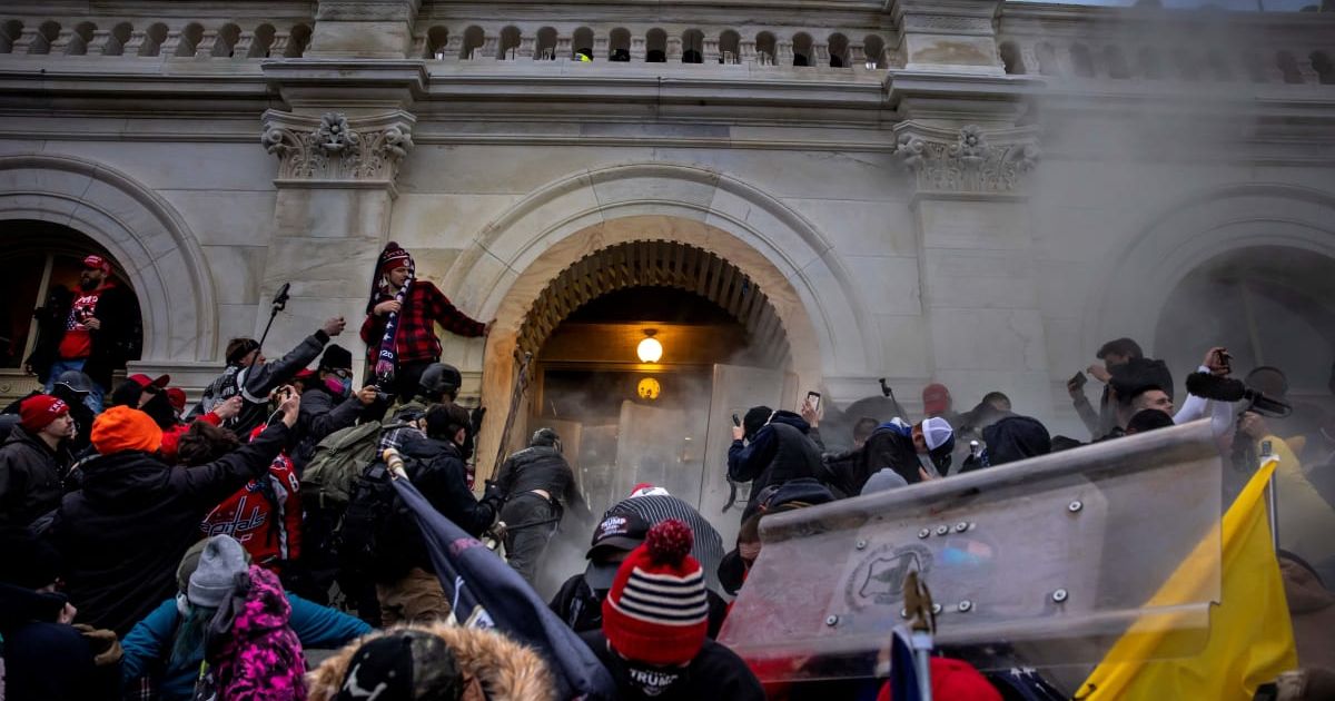 The new timeline alleges that 'provocative tactics' by law enforcement turned a peaceful crowd into chaos, while claiming Nancy Pelosi invited the breach to seize power (Getty Images)