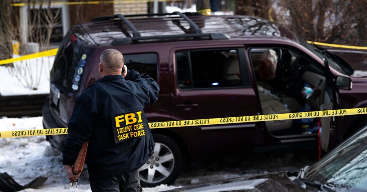 Members of law enforcement work at the scene following a suspected shooting by an ICE agent during federal law enforcement operations in Minneapolis, Minnesota (Getty Images) 