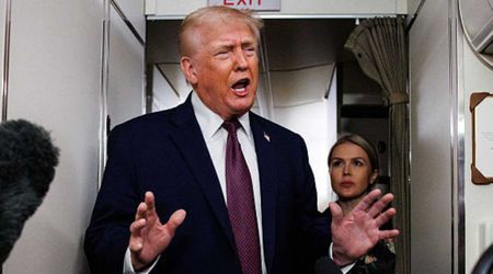 Trump jokes 'I’m looking for something to grab and it’s not Karoline' as turbulence hits jet