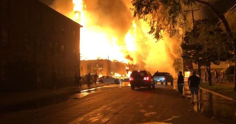 Fact Check: Is clip of protesters rioting, burning a building after Minnesota ICE shooting real?