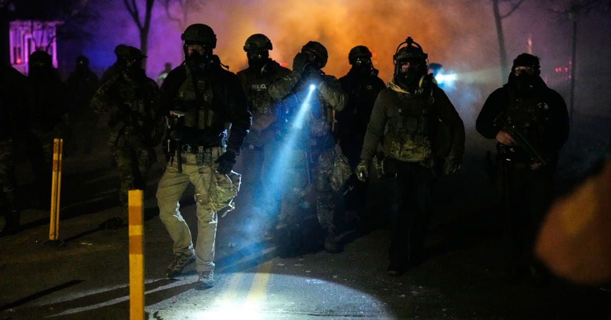 A federal officer in Minneapolis shot a man in the leg during an arrest attempt just days after an ICE agent fatally shot Renee Nicole Good (AP Photo/John Locher)