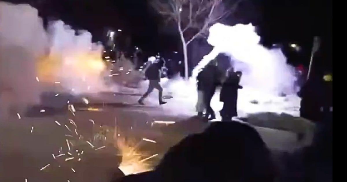 ICE agents clashed with protesters in North Minneapolis after an agent shot a man in the leg during a law-enforcement operation on Jan 14, 2026 (X/@rawsalerts)