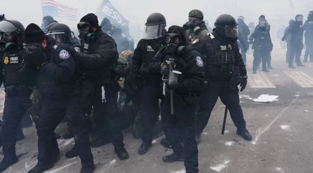 Federal agents deploy tear gas and grenades to clear protesters near Whipple Federal Building