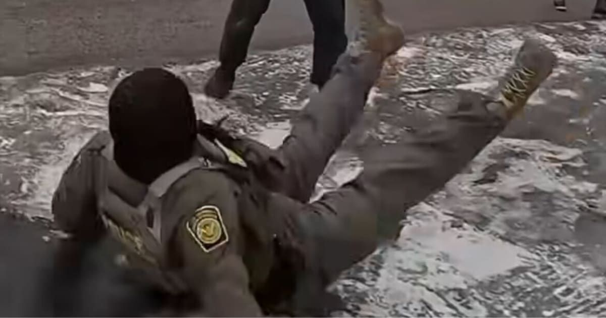 A viral clip showed an ICE agent running toward protesters in Minneapolis before slipping and falling on ice (@diet_prada/Instagram)