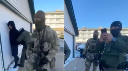 Video shows ICE agent slamming man against garage door after demanding papers due to 'his accent'