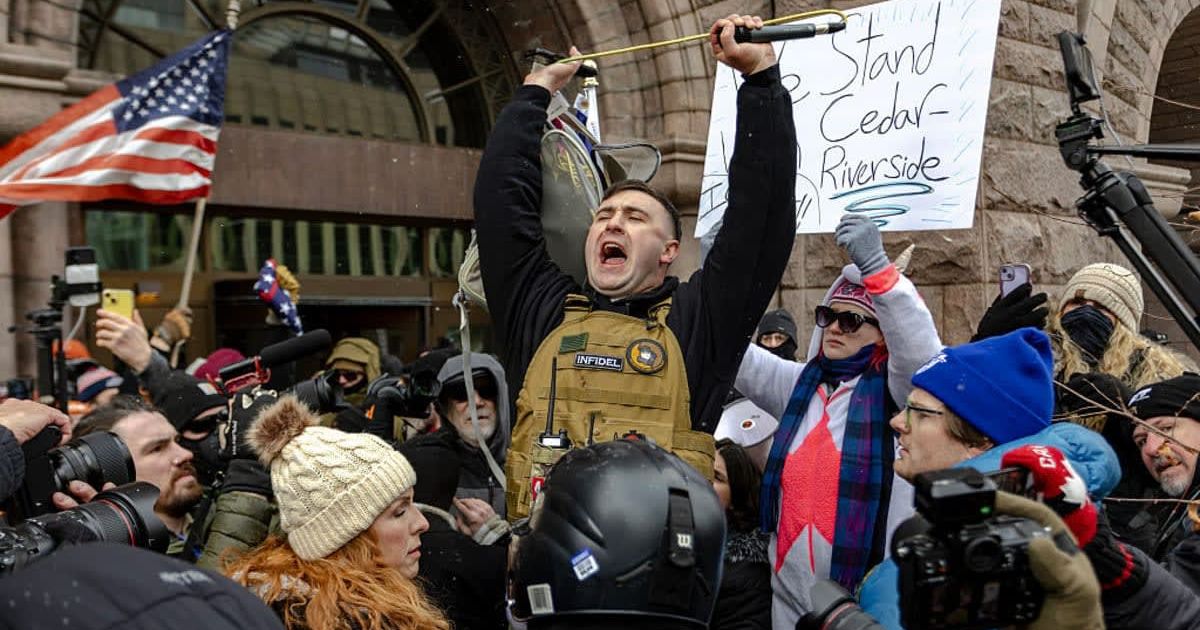 Jake Lang was injured at a violent Minneapolis protest after organizing a rally, with videos showing him bleeding as opposing protesters dragged and kicked him (Jim Vondruska/Getty Images)