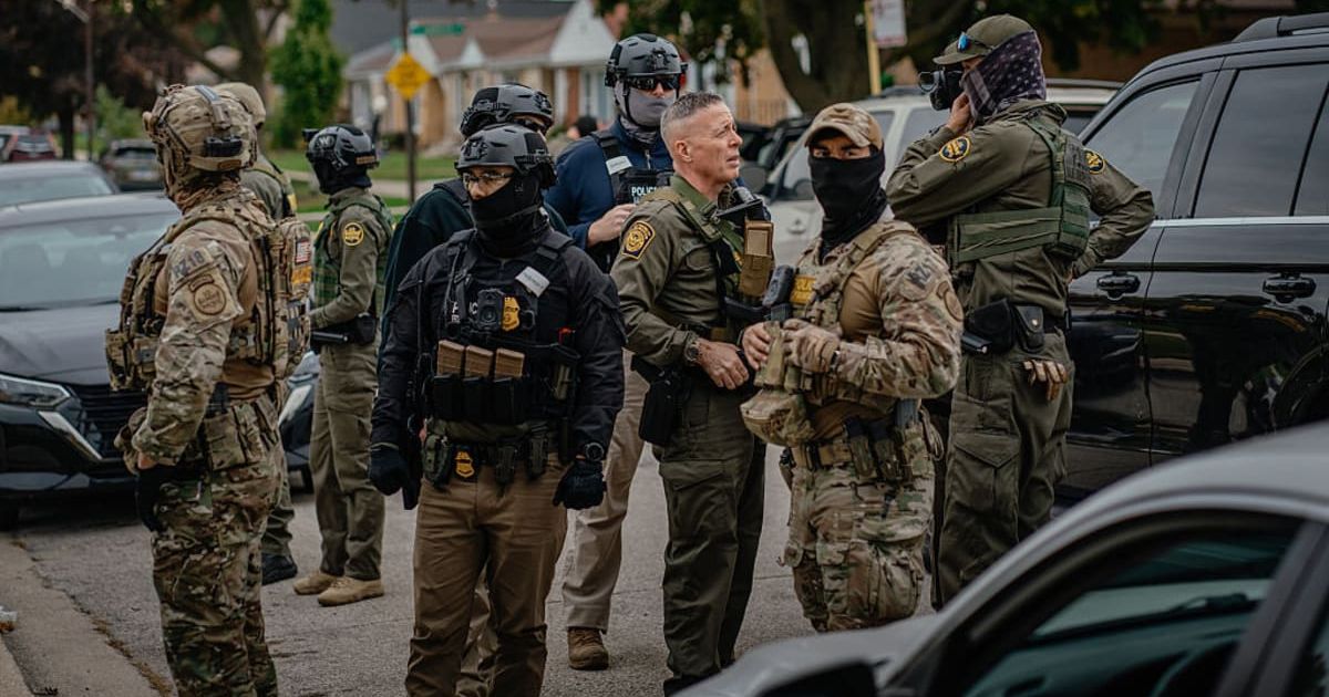 A viral clip showed an armed man outside a home in St Paul protecting neighbors from ICE (Getty Images)