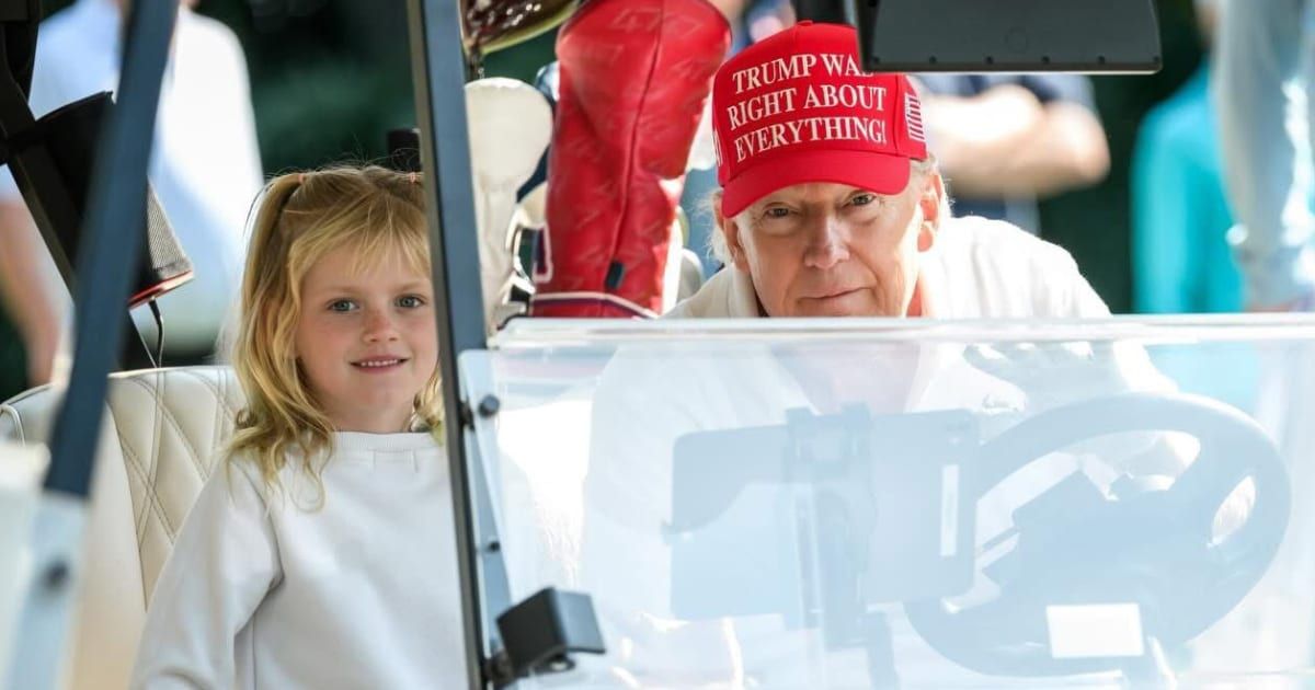 President Donald Trump is seen on grandpa duty with Carolina, the daughter of Eric and Lara Trump (Lara Trump/Instagram)