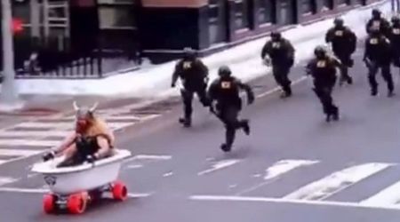 Fact Check: Is the viral video of ICE agents chasing man in Viking costume on the street real?