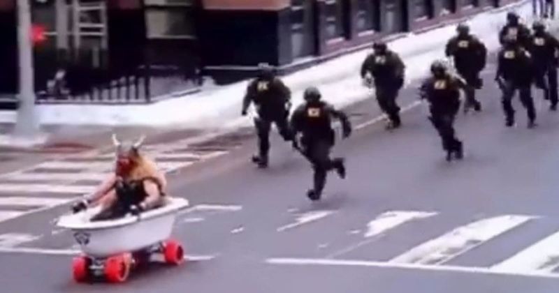 Fact Check: Is the viral video of ICE agents chasing man in Viking costume on the street real?