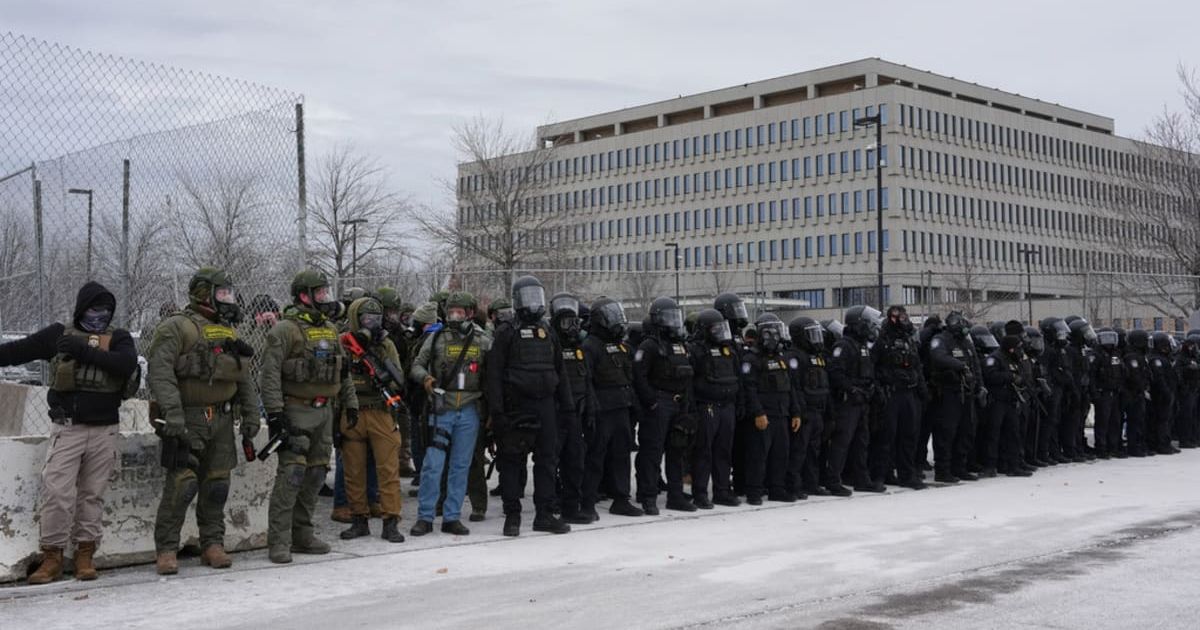 Off-duty police officers in the Twin Cities were said to have been targeted by federal immigration agents during recent enforcement operations, prompting alarm among local law enforcement leaders (AP Photo/Adam Gray)