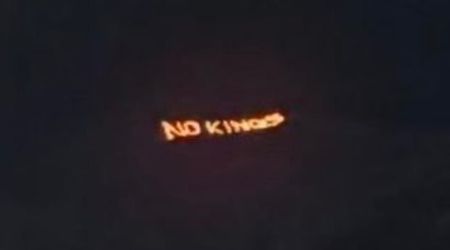 ‘No Kings’ sign spotted in Davos ahead of Trump’s WEF address sparks backlash