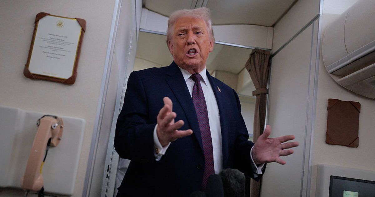 US President Donald Trump speaks to reporters about Venezuela and its future on board Air Force One while flying in between Ireland and Washington as he returns from the World Economic Forum on January 22, 2026 (Getty Images)