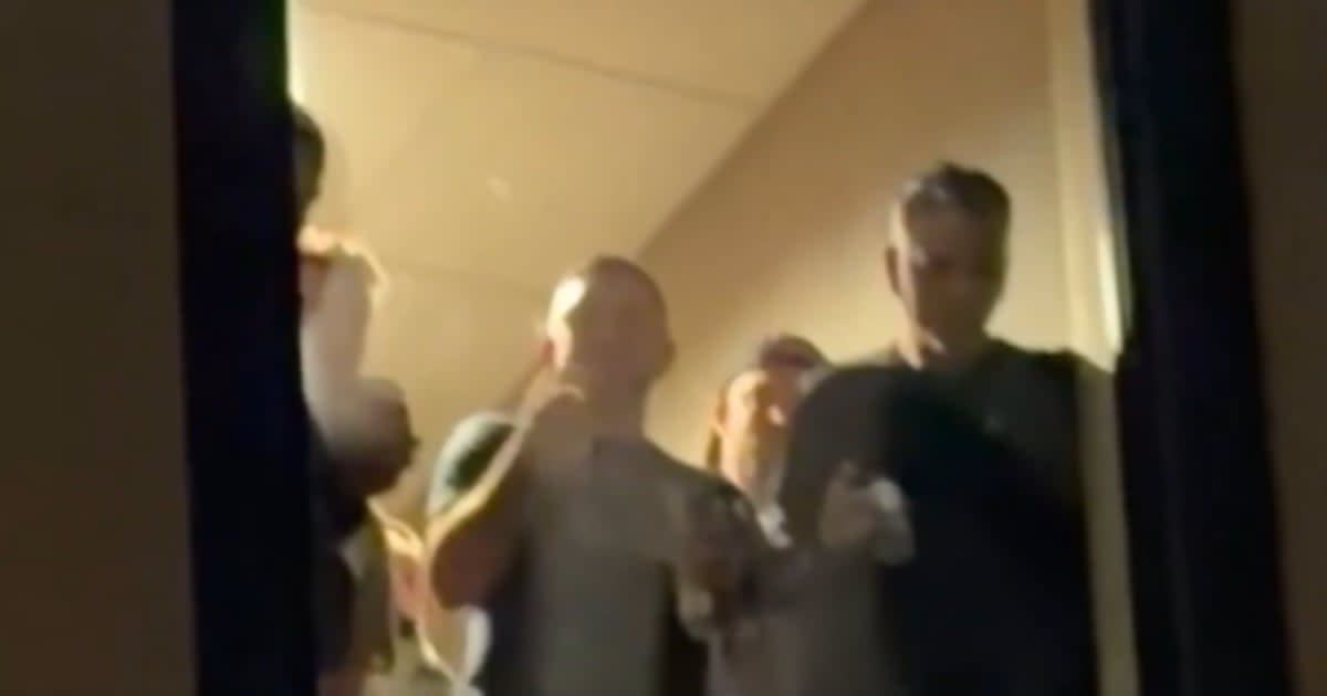 A video went viral claiming to show Federal agents drinking beer near a hotel window amid an anti-ICE protest (@Breaking911/X)