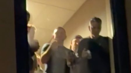 Fact check: Did video show Federal agents drinking beer near hotel window amid anti-ICE protest real?