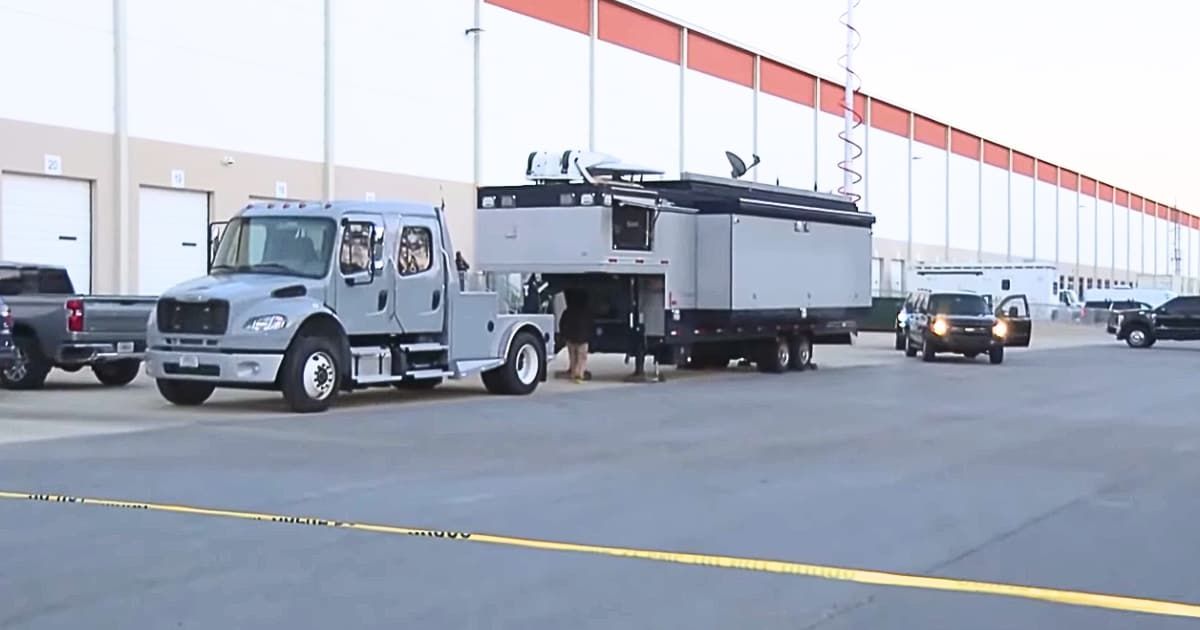 A truck was seen outside the Fulton County election office, parked by the FBI as they seized 2020 ballots (@11alive/YouTube)