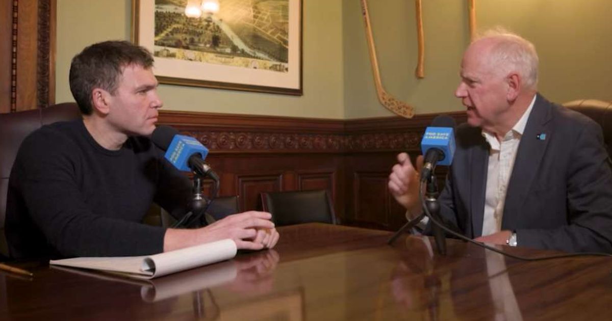 Tim Walz spoke about fraud investigations during a January interview on Pod Save America (@podsaveamerica/YouTube)