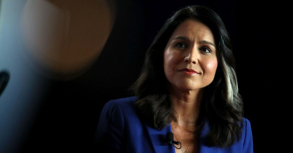 Director of National Intelligence Tulsi Gabbard's expanded role drew White House defense, as officials said her presence with FBI agents underscored election security duties (Getty Images)
