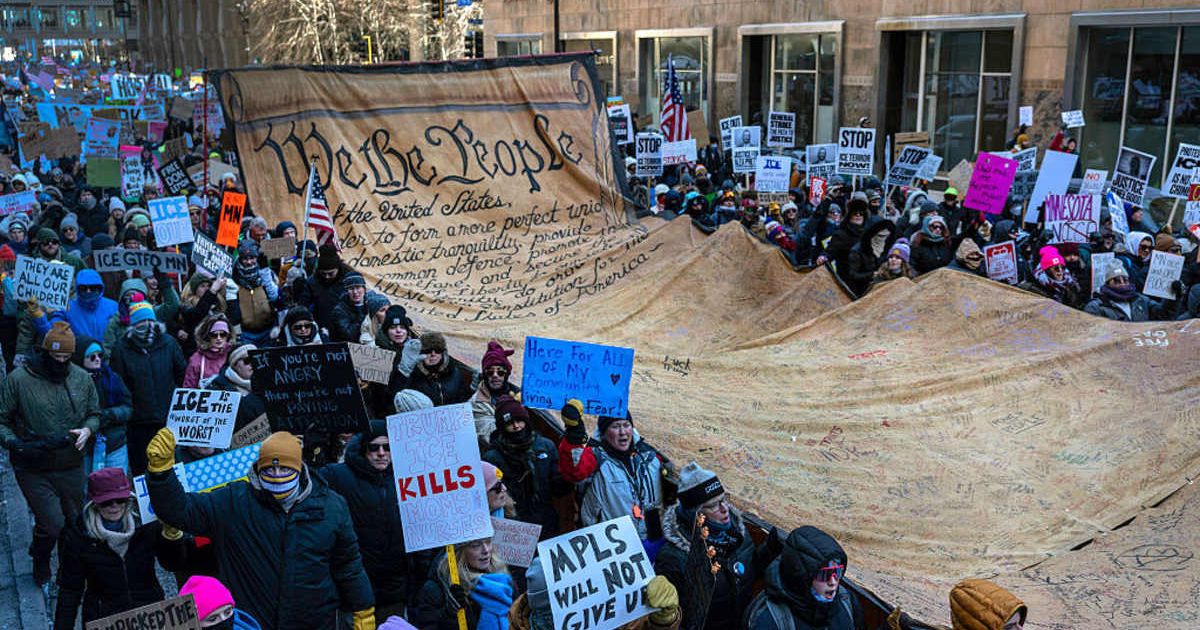 Demonstrators march calling for an end to ICE operations in Minnesota on January 30, 2026 in Minneapolis, Minnesota (John Moore/Getty Images)