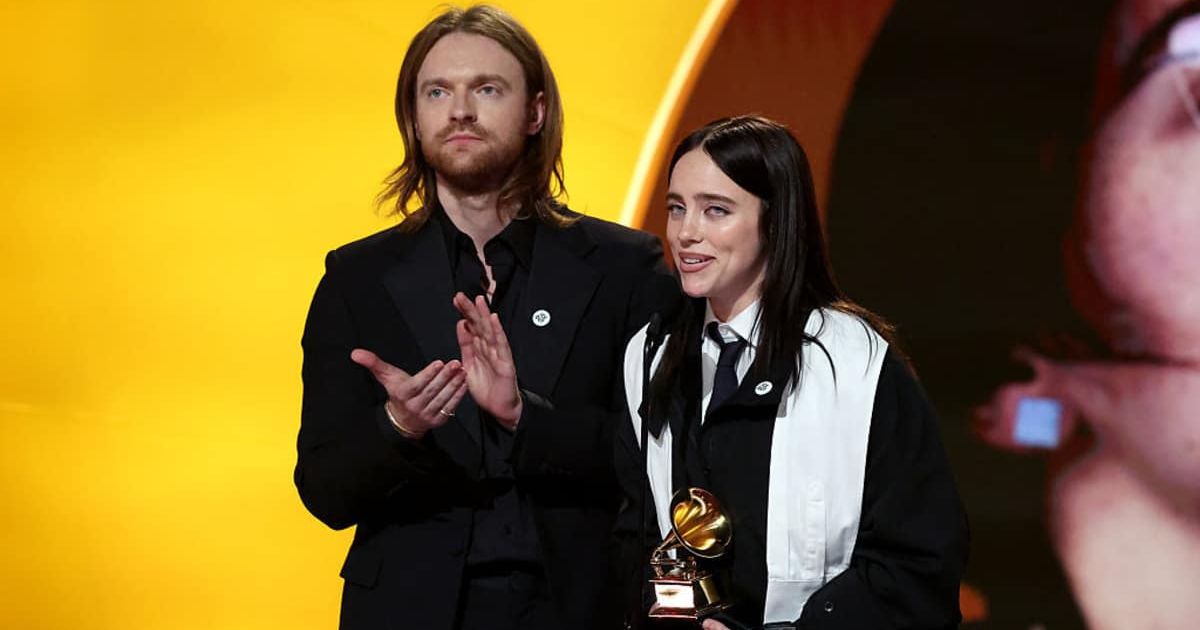 FINNEAS and Billie Eilish accept the Song of the Year award for 'WILDFLOWER' onstage during the 68th GRAMMY Awards at Crypto.com Arena on February 1, 2026, in Los Angeles, California (Kevin Mazur/Getty Images)