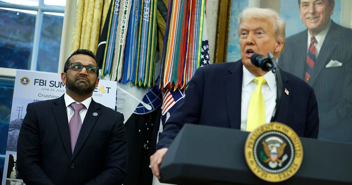 Donald Trump speaks with FBI Director Kash Patel at a White House press conference in the Oval Office on October 15, 2025, in Washington, DC (Getty Images) 