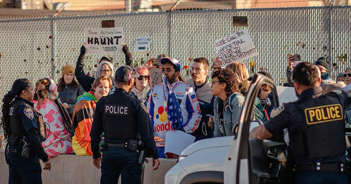 Local police confront a demonstrator outside an Immigration and Customs Enforcement processing and detention facility on October 31, 2025, in Broadview, Illinois Getty Images)  
