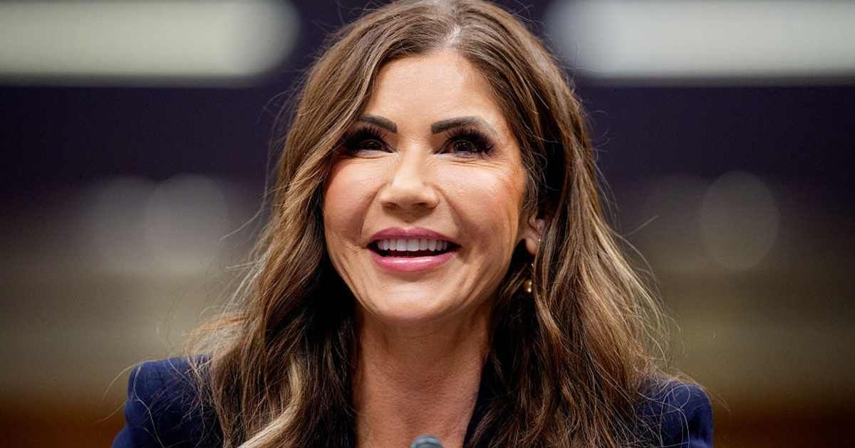 Homeland Security Secretary Kristi Noem addresses Border Patrol agents during an on-site briefing near the southern border (Getty Images) 